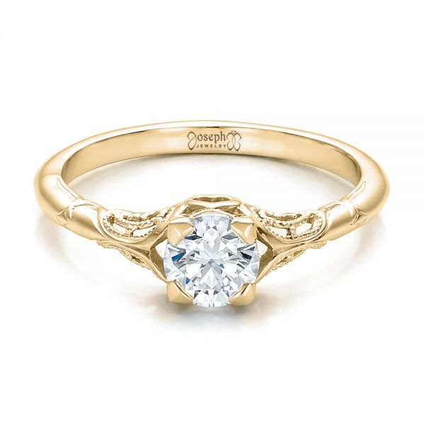 gold solitaire engagement ring