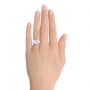 14k White Gold 14k White Gold Three-stone Radiant Channel Set Engagement Ring - Hand View -  107384 - Thumbnail